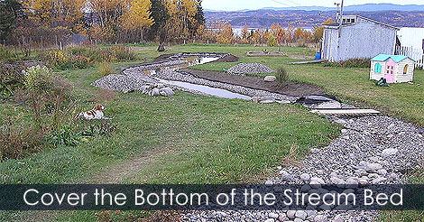 How to build a garden stream - Cover the bottom of the stream bed - Garden stream edging