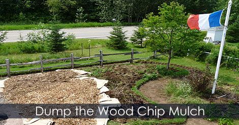 Sheet Mulching Step by step - Dump the wood chip over the cardboard - No dig garden bed tips