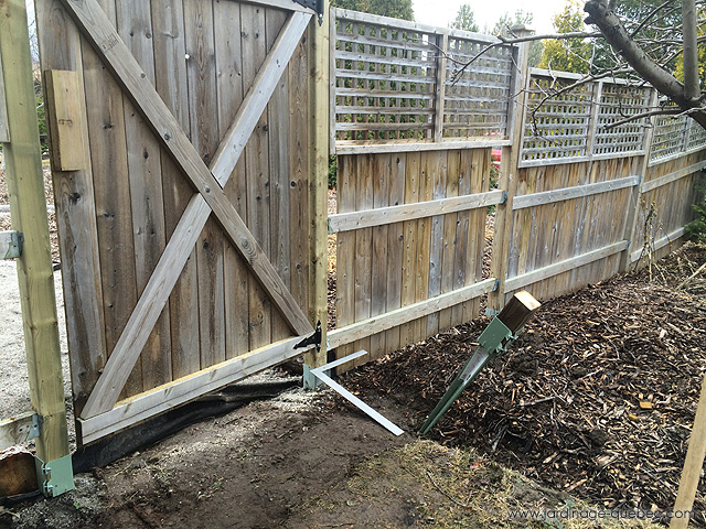 Repair leaning wood fence post