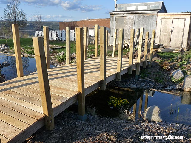 how to build an arched foot bridge - build a garden bridge from wooden boards - 