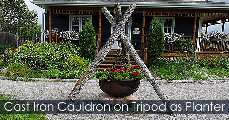 Large vintage cast iron cauldron from tripod as planter