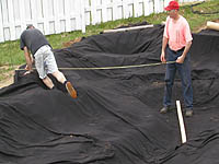 How to lay a pond liner - How to construct a Garden Pond - Installing pond liner underlay - Backyard Pond building Instructions - DIY Pond liner installation