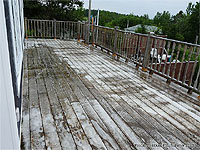 Apply the cleaning solution to the deck - Deck cleaner for mold and mildew - How to clean a deck - How to clean outdoor wood
