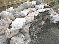 How to build a wall waterfall - Pond Waterfall header - How to build a pondless waterfall 