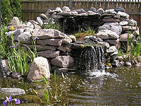 Build a waterfall - Quick guide to building a stone-lined, fit-anywhere, good-looking backyard pond.