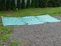 Plastic tarp - Tips for paver installation - DIY Paver Walkway - Storage area for paver base materials
