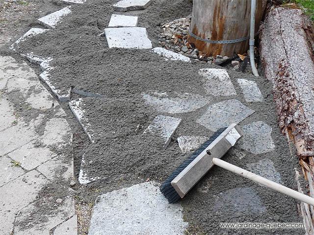 Filling in joints between pavers