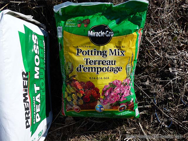 Enriched Potting Mix - Miracle Gro Potting Mix - Filling planter boxes