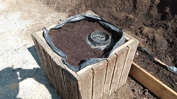 Terreau pour bacs et dispositif d'arrosage